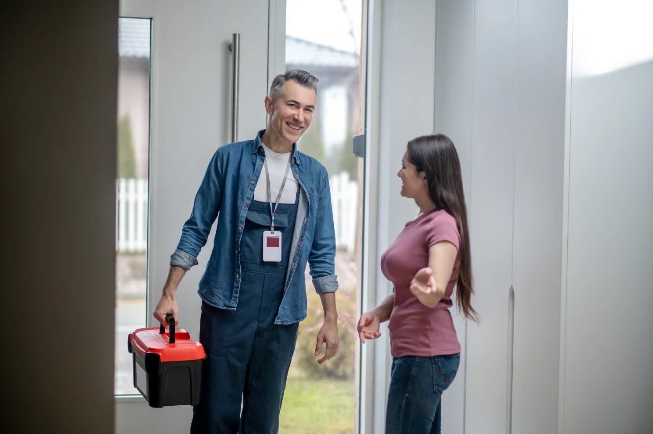 Homeowner consultation with restoration specialist
